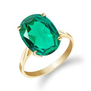 14K. GOLD RING WITH LAB. CREATED OVAL EMERALD
